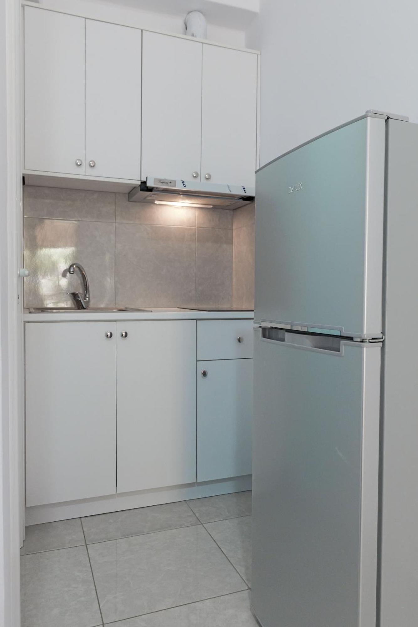 Guesthouse Moonlight Downtown Ксамил Екстериор снимка